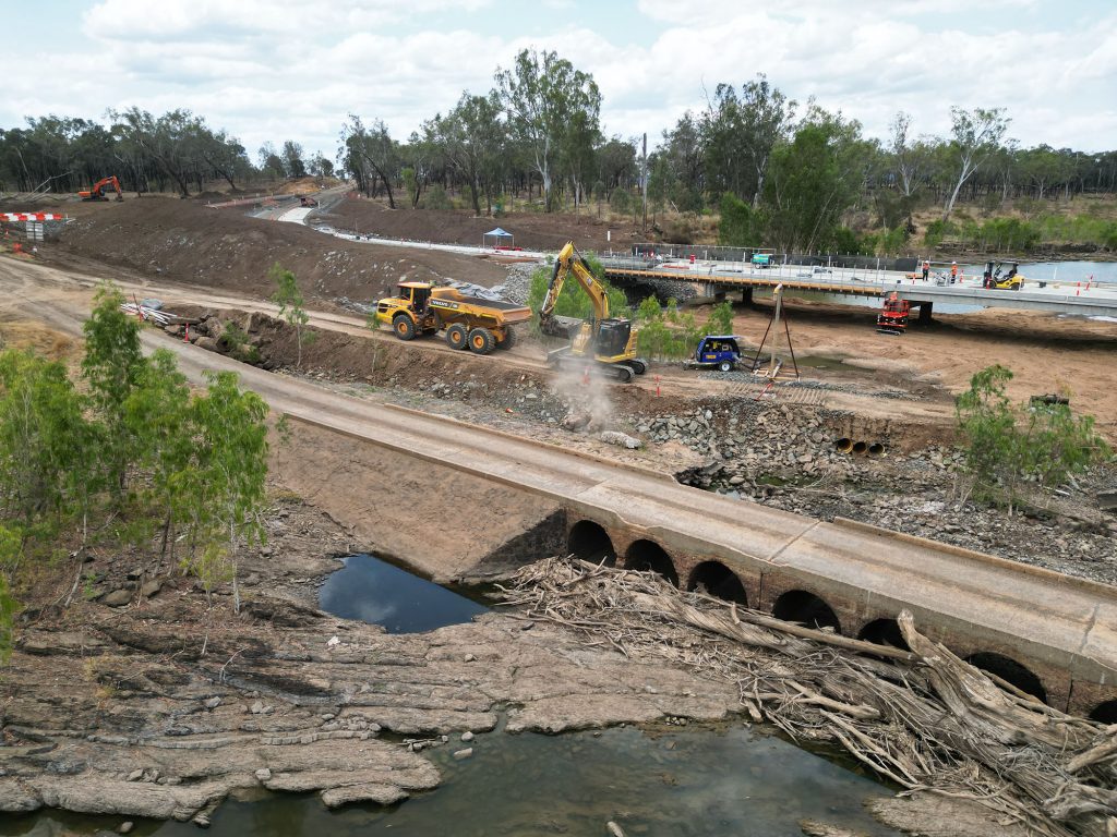 Earthmoving equipment on a bridge construction site